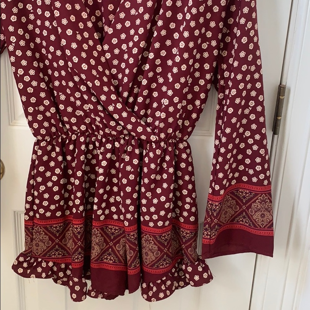 Maroon white and gold long sleeve romper